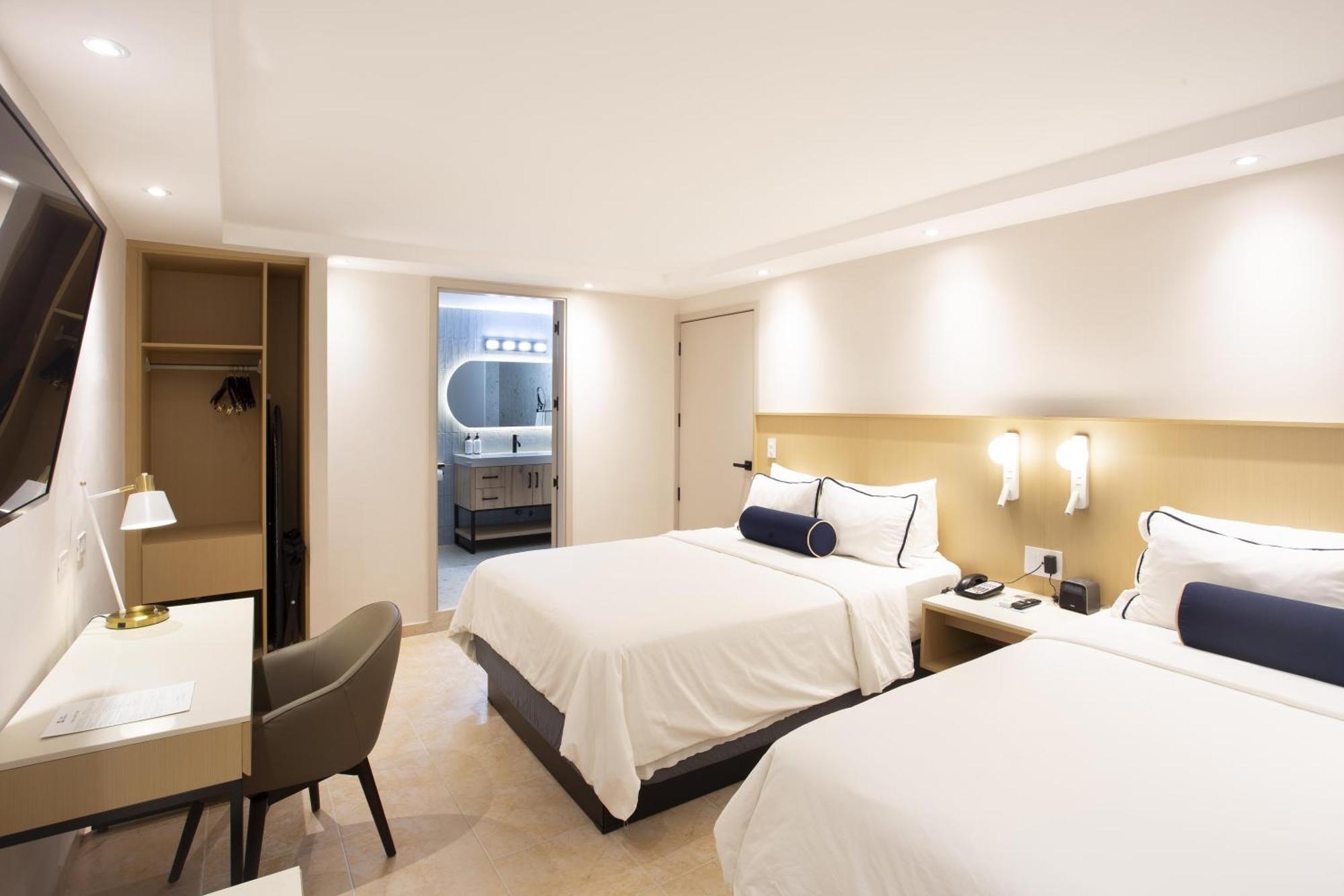Queen Suite with Two Queen Beds, Sofa Bed and Living Room - Non-Smoking